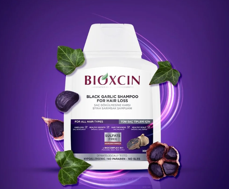 شامپو ضد ریزش مو بیوکسین مدل Black garlic حجم 300میل